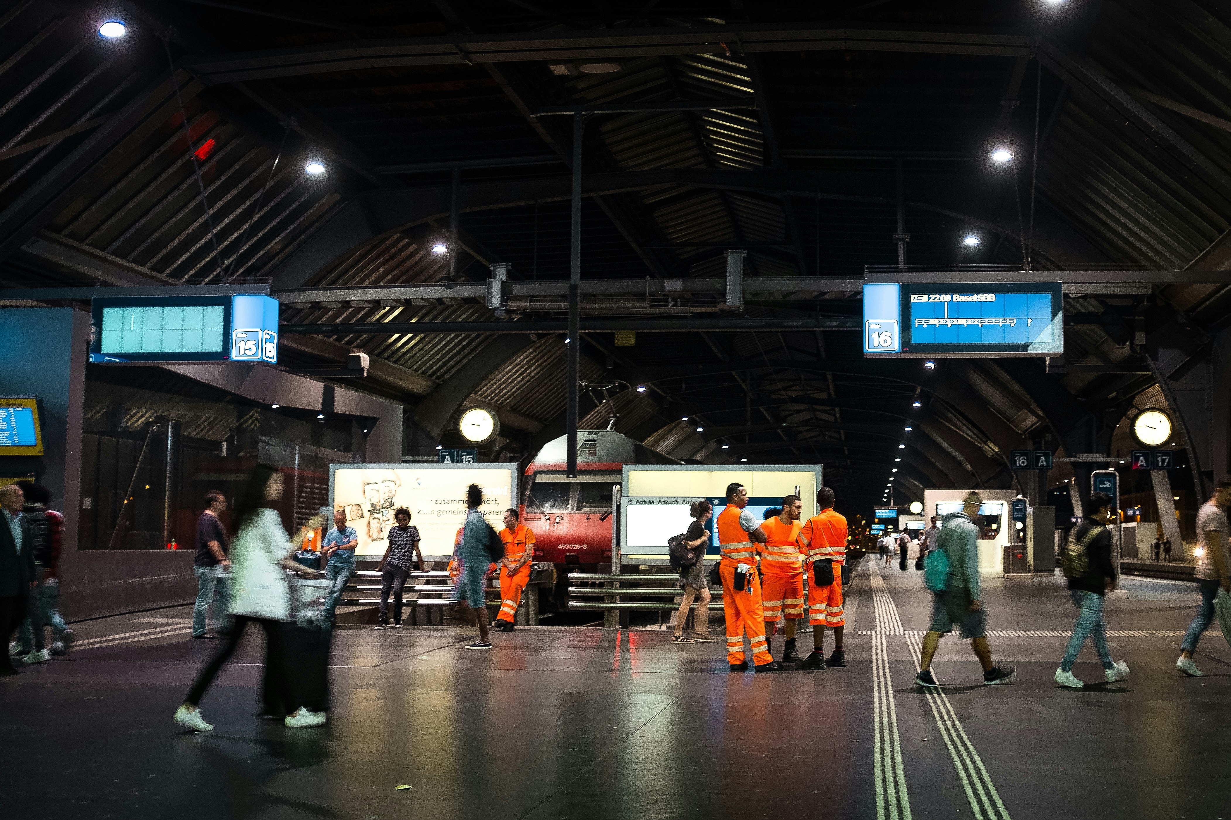 people walking near train